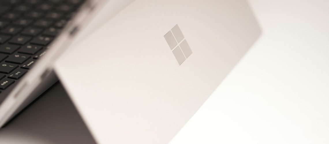 white-laptop-computer-on-white-table